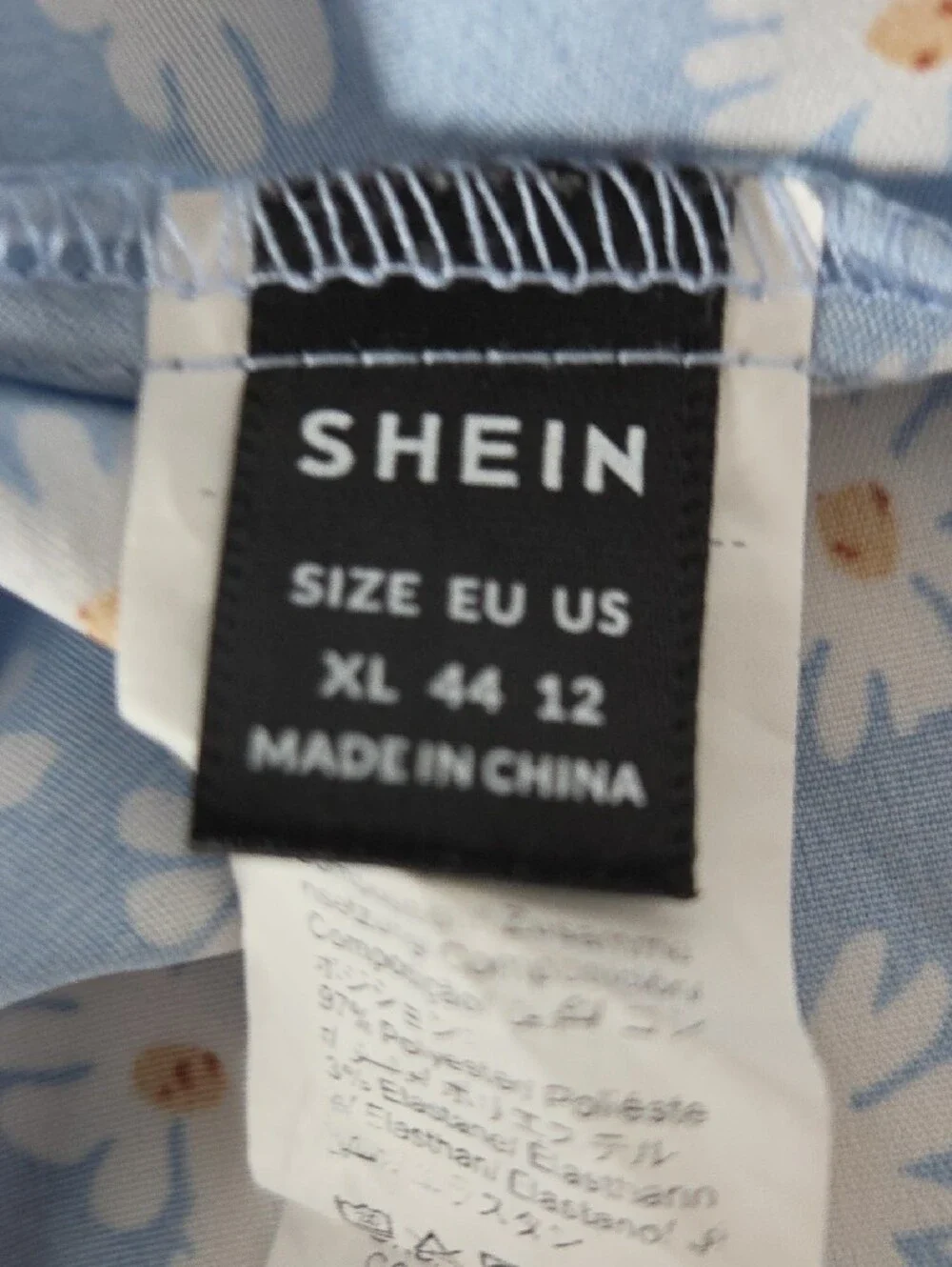 SHEIN Blue Daisy Wrap Peplum Puff Sleeve Top